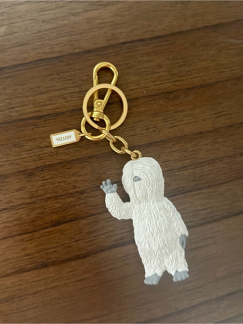 Aritzia White Yeti Keychain with Gold Hardware